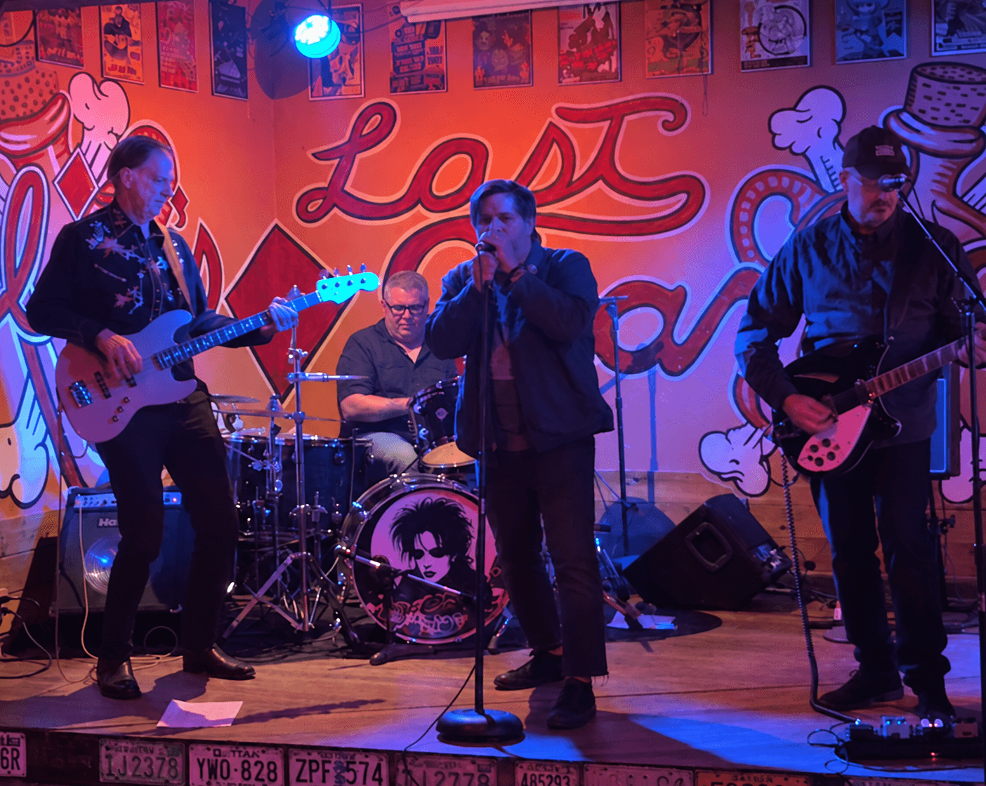 All four members of DRVR.8 performing at the Last Chance Saloon in Seattle on September 4, 2026.